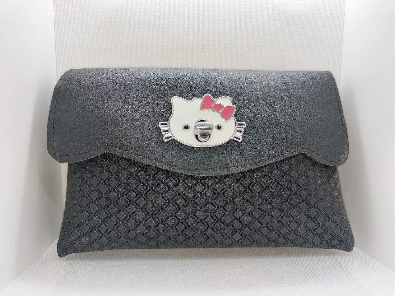 Holland Bags Mini Clutch met textuur en kattenbadge