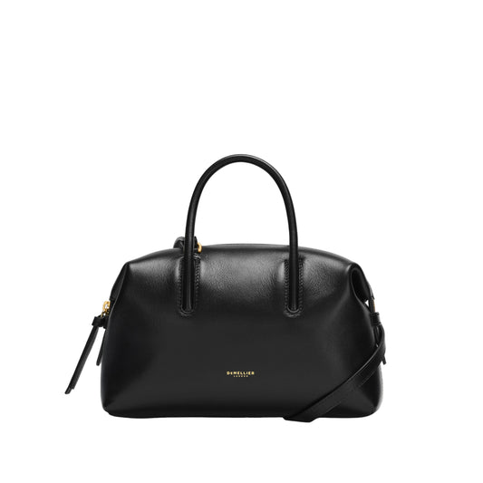 Black handbag with a visible brand logo on a light background