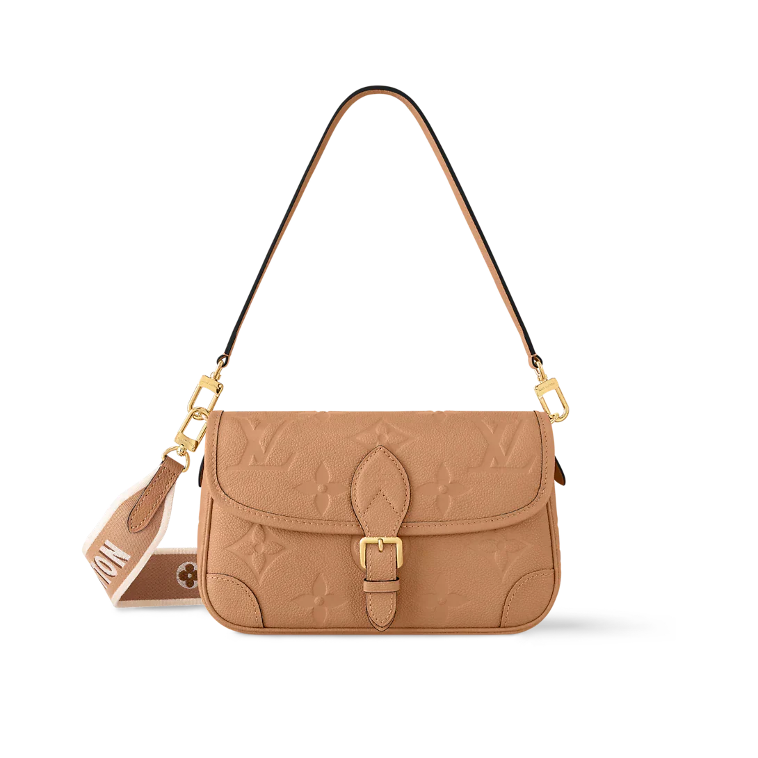 Beige handbag with gold accents on a white background