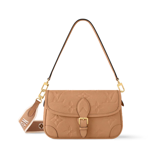 Beige handbag with gold accents on a white background
