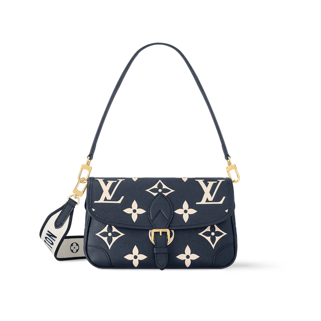 Navy handbag with white monogram pattern on a white background